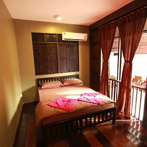 Kamer met een Queen Size Bed